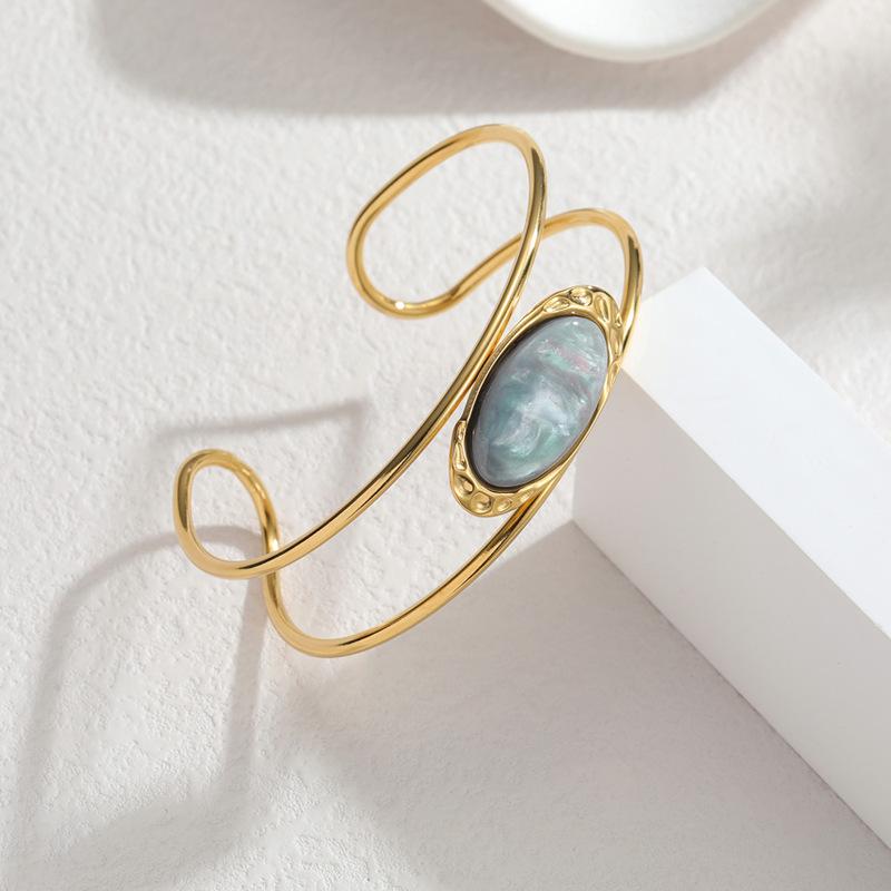 18K Gold-Inlaid Stainless Steel Hollow Line Bracelet with Stone - Elegant Fashion Jewelry for Women