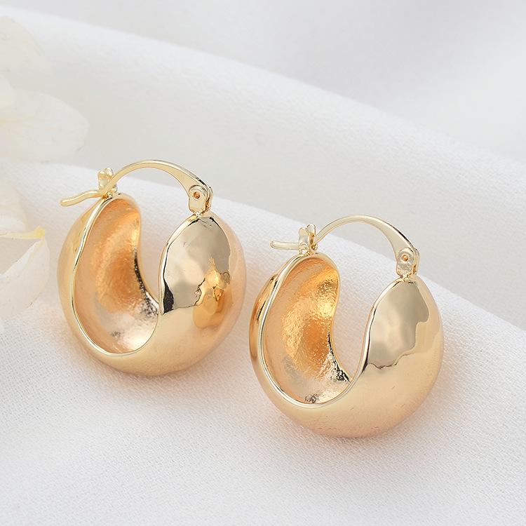 

Exaggerated Geometric Gold Earrings for Women - DIY Simple Studs & Ear Cuffs