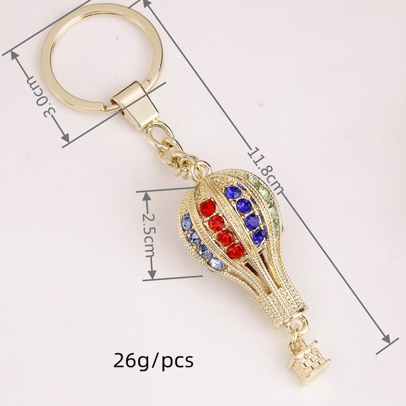Hot Air Balloon & Hamburger Golden Keychain with Melon Seed Alloy and Sand Gold Ingot