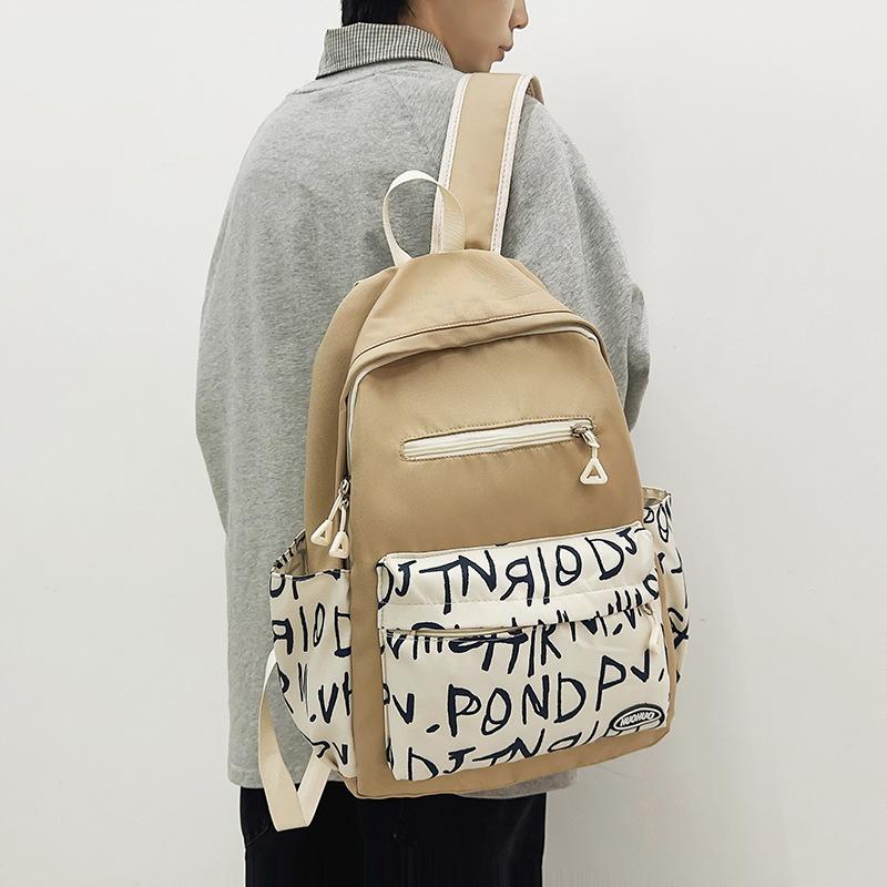 Schoolbag casual backpack women's nylon printing junior high school schoolbag simple college student color scheme fashionable campus backpack men