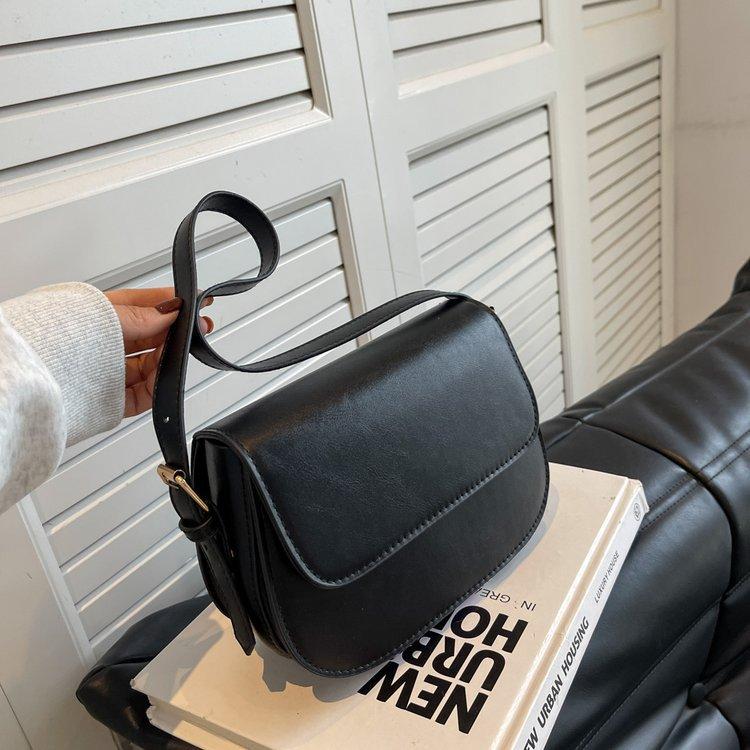 Beliebte Tasche Damen 2024 neue Retro schräge Spanntasche ausländische vielseitige Umhängetasche strukturierte kleine quadratische Tasche