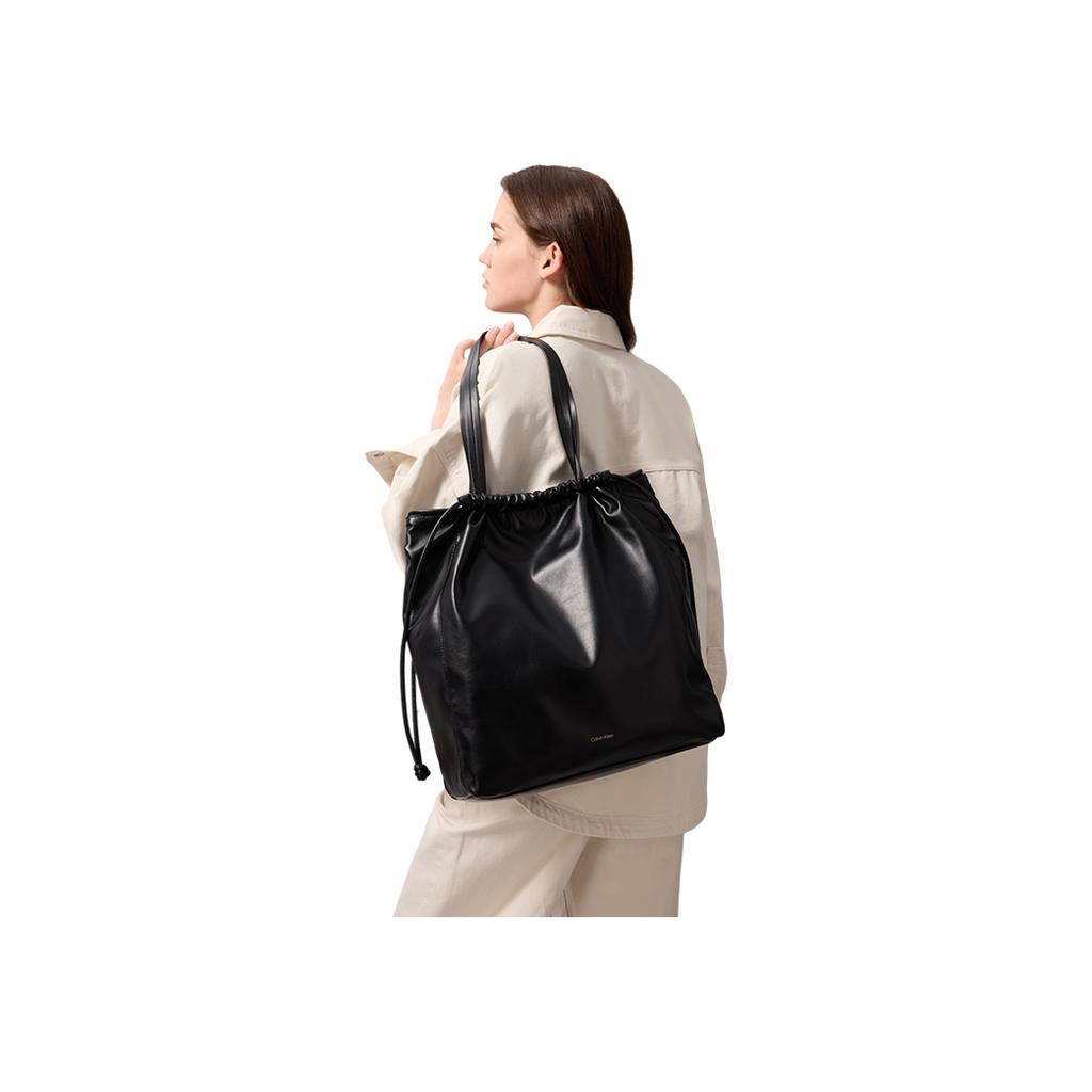 Calvin Klein Fashionable Compact Printed Drawstring Tote Bag Medium Women handbags Space-Black 4K3159G-UB1
