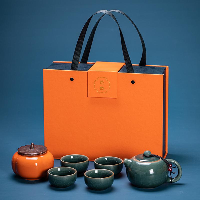 

Керамика плотного обжига Ягуан, чайник и четыре чашки, банка для кунг-фу чайного набора и изысканная хурма в подарочной коробке для клиентов и сотрудников.