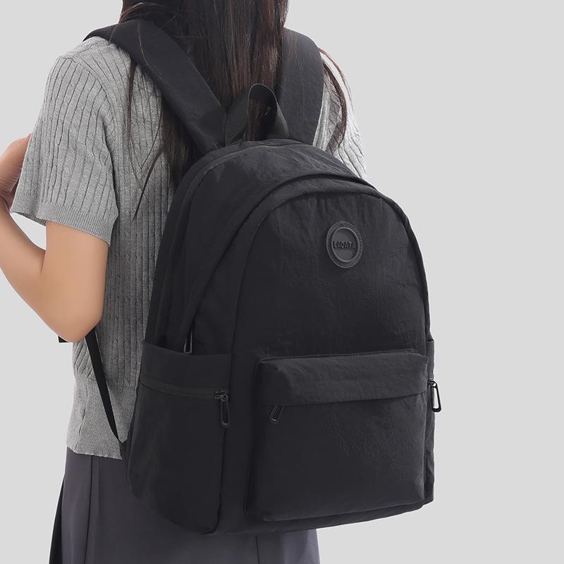 Schoolbag Korean version of high-value casual backpack for women college students, simple and lightweight schoolbag, large-capacity commuter