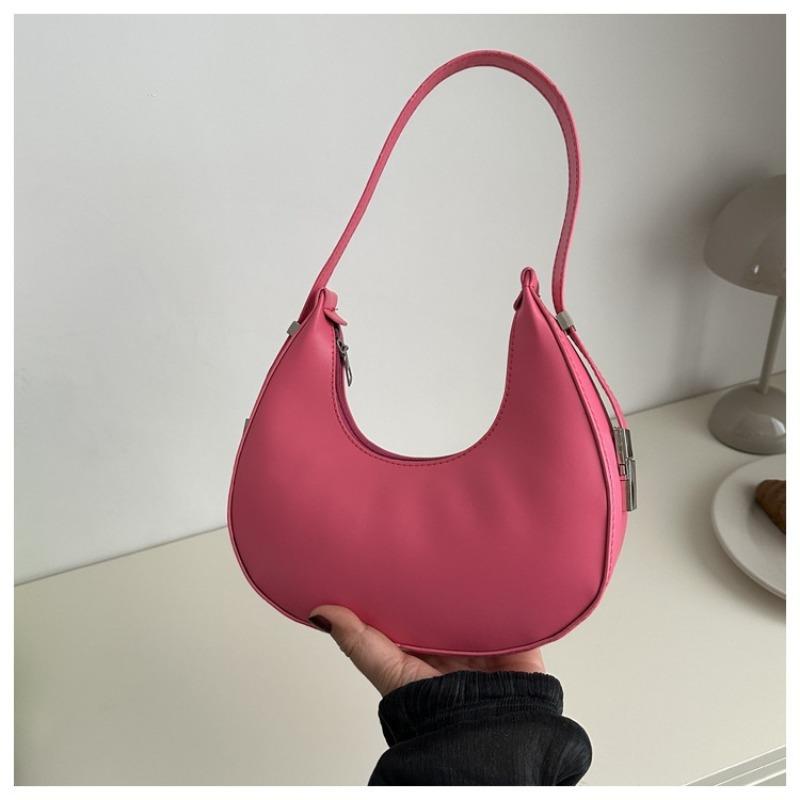 

Niche solid color design bag women s new trendy simple personalized underarm crescent bag personalized portable shoulder bag глибокий рожевий колір
