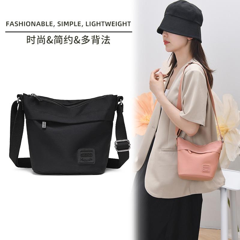Modetrend Umhängetasche Sommer neue Stofftasche hoher Wert Pendler Messenger Bag große Kapazität Bucket Bag