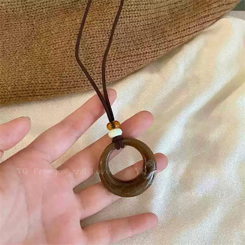 Coffee circle braided rope necklace women's simple fashion high-end long sweater chain light luxury niche accessories