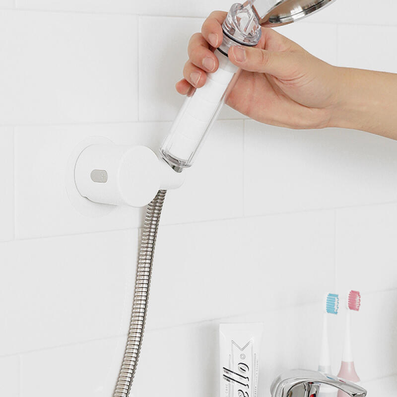 Easy-to-install, no-punch, adjustable, free-hand shower head holder
