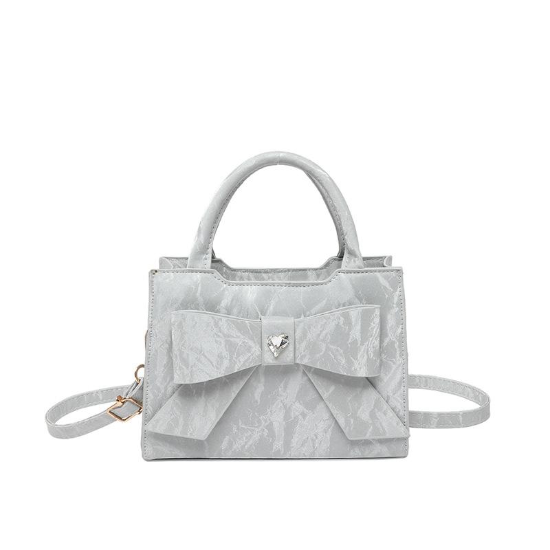 Highend fashion women's handbag bow simple shoulder messenger bag commuter versatile women's bag