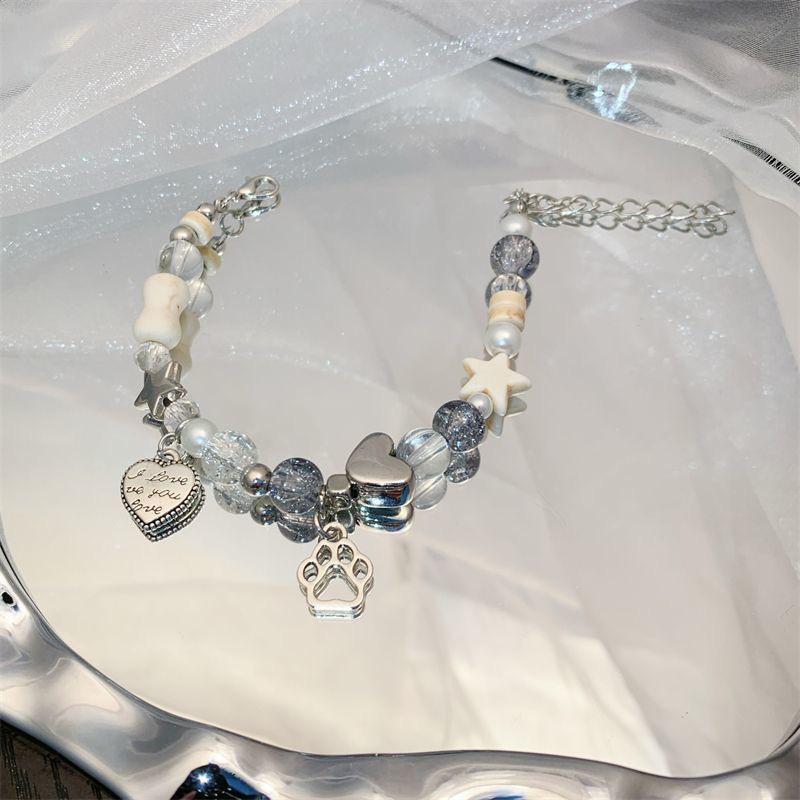 Bracelet Os de Griffe de Chat Étoile d'Oxygène: Accessoire de luxe fait main polyvalent avec perles pour femmes