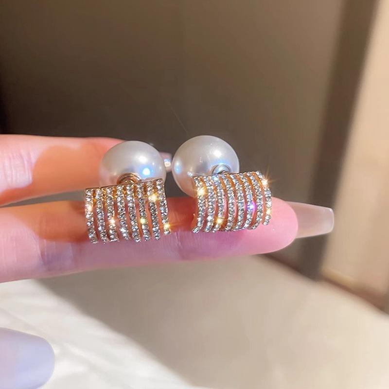 Fashion Geometric Bow Flower Pearl Earrings Women'S Premium Versatile Small Fragrant Wind Earrings