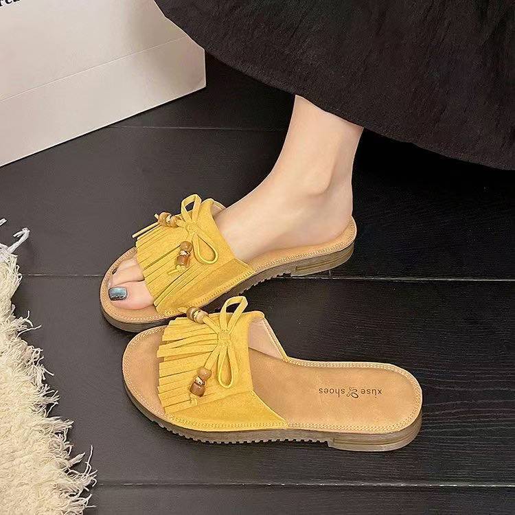 Holiday versatile one-word drag women wear 2025 summer fashion Internet celebrity seaside beach flat bottom non-slip cool slippers women