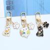 Creative Black & White Cat Paw Keychain Pendant - Metal Animal Bag Accessory