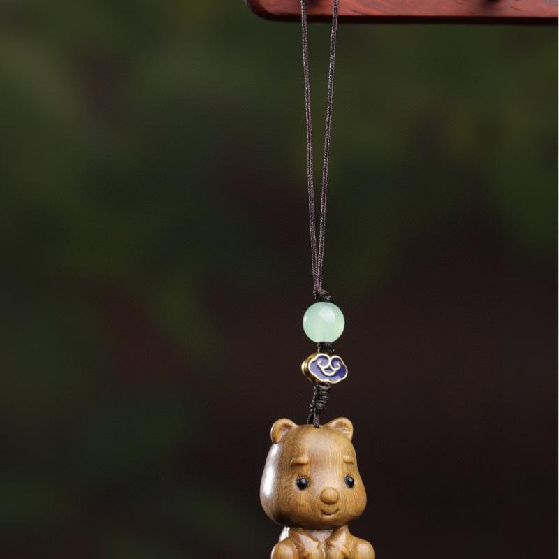 Twelve Zodiac Animal Charms Green Sandalwood Set: Rat, Ox, Tiger, Rabbit, Dragon, Snake, Horse, Sheep, Monkey, Rooster, Dog, Pig.