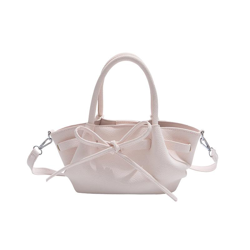 

2025 spring new Korean version fashionable small fresh portable vegetable basket bag niche casual high-end textured messenger bag розовый