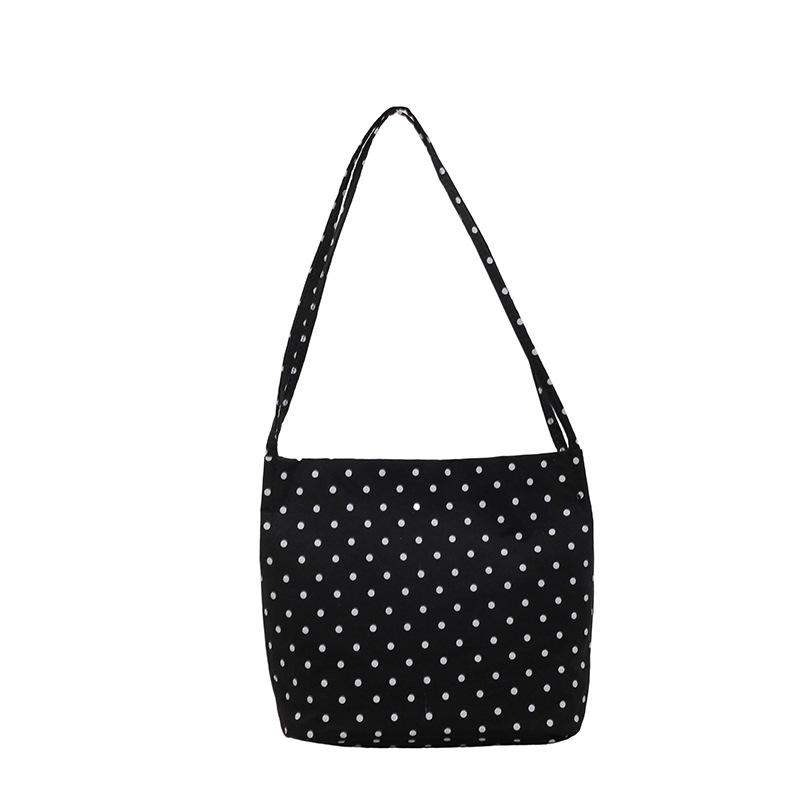 Torba Totebag w Kropki - Modna i Stylowa Jednoramienna Torba typu Bucket z Unikalnym Wzorem, Odpowiednia dla Osób Preferujących Małe Torby.