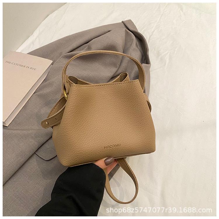 Fashion design hand-held small bag bag women's 2025 new retro versatile bucket bag women's commuter shoulder crossbody bag