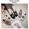A piece of piled and thickened beanie shoes, women's lazy home shoes with one foot, warm flat-bottomed fluffy cotton shoes