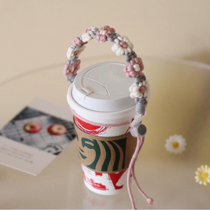 

Ins Hand-Woven Two-Color Daisy Portable Coffee Cup Milk Tea Water Cup Set Rope Handheld Lanyard Woven Water Cup Lanyard Coffee Cup Hand Strap Finished Product