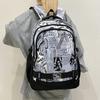 Zaino scolastico nuovo zaino di grande capacità moda zaino per studente delle scuole superiori e del college zaino da uomo graffiti stampa casual borsa da pendolare zaino tendenza