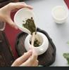 Ling Yi White Porcelain Gongfu Tea Set: Tea Spoon, Tea Measure, Portioning Tray, and Accessories.