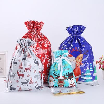Neue Weihnachtsgeschenk-Verpackungstasche Weihnachtsmann Schneemann Aufdruck Kordelzug Geschenkbeutel Aluminiumfolie Weihnachtsdekorationsprodukte