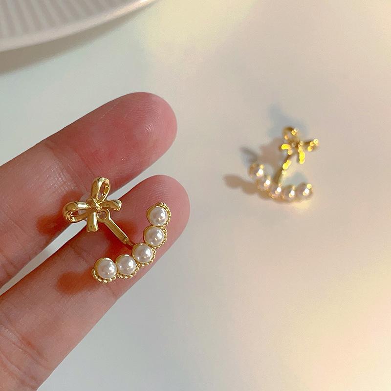 Bow pearl earrings compact fashion stud earrings light luxury high sense versatile ins earrings women
