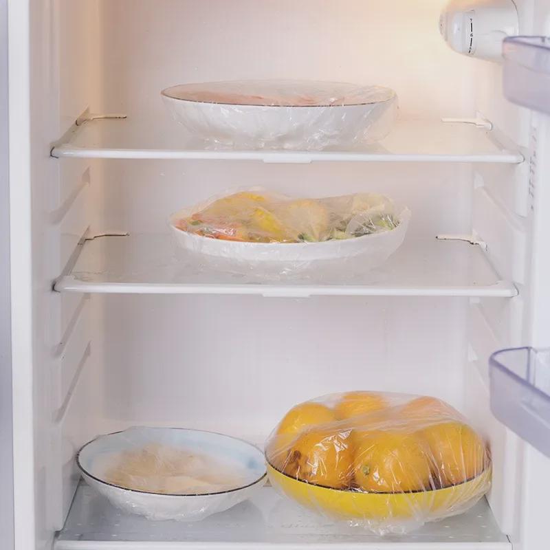 Sada přilnavých fólií: Potravinářské, odolné vůči zápachu, jednorázové s elastickým uzávěrem pro zbytky.