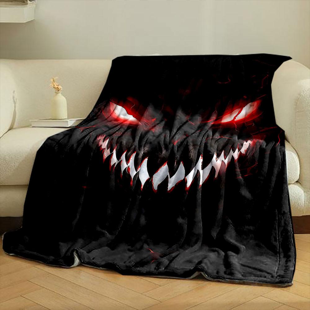 Sinister, glowing red eyes and sharp white teeth in a dark background. for all seasons blanket lunch break throw gift