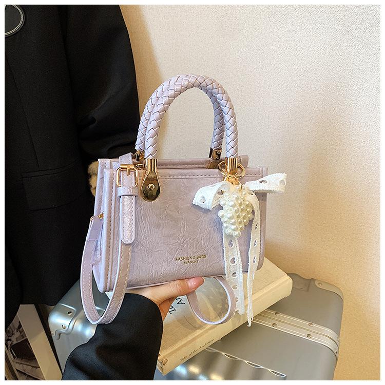 

Small bag women s summer versatile 2025 new fashion simple messenger bag portable small square bag фиолетовый