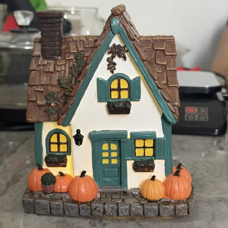 Indoor Resin Harvest House Statue with Warm Window Lighting for Halloween Shelf Styling and Seasonal Fall Scenes
