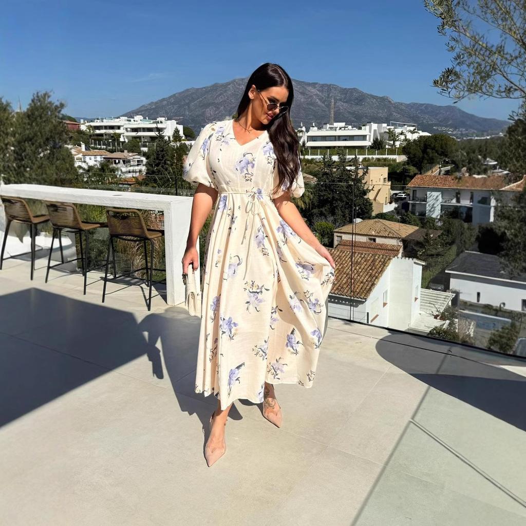 A New Summer Women's Dress with A V-neck, Puffed Sleeves, Printed Ties and A Large Swing