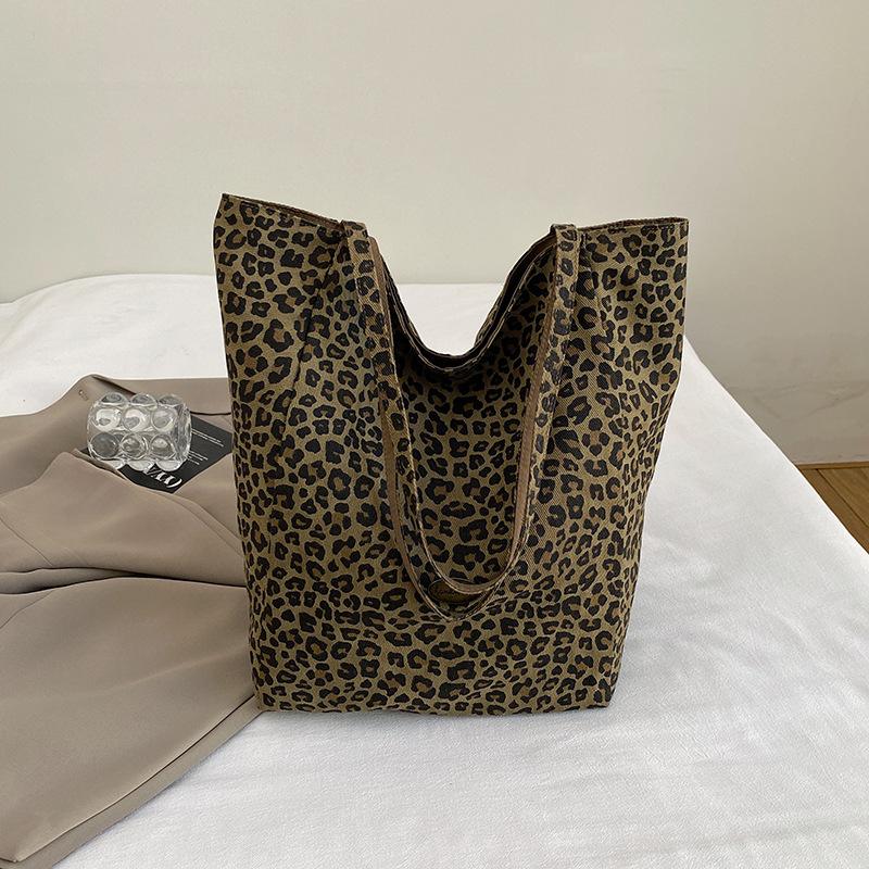 

Leopard print double-sided canvas bag shoulder bag large capacity portable large capacity tote bag college style leisure student schoolbag