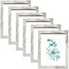 Minimalist Wooden Photo Frame Set: Five-Piece DIY Wall Display, Fits 8-Inch, A4, and A3 Photos.