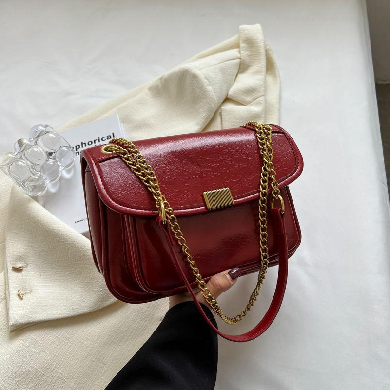 

Korean version of retro high-end stray bag niche design simple chain shoulder messenger bag temperament versatile tote bag красный