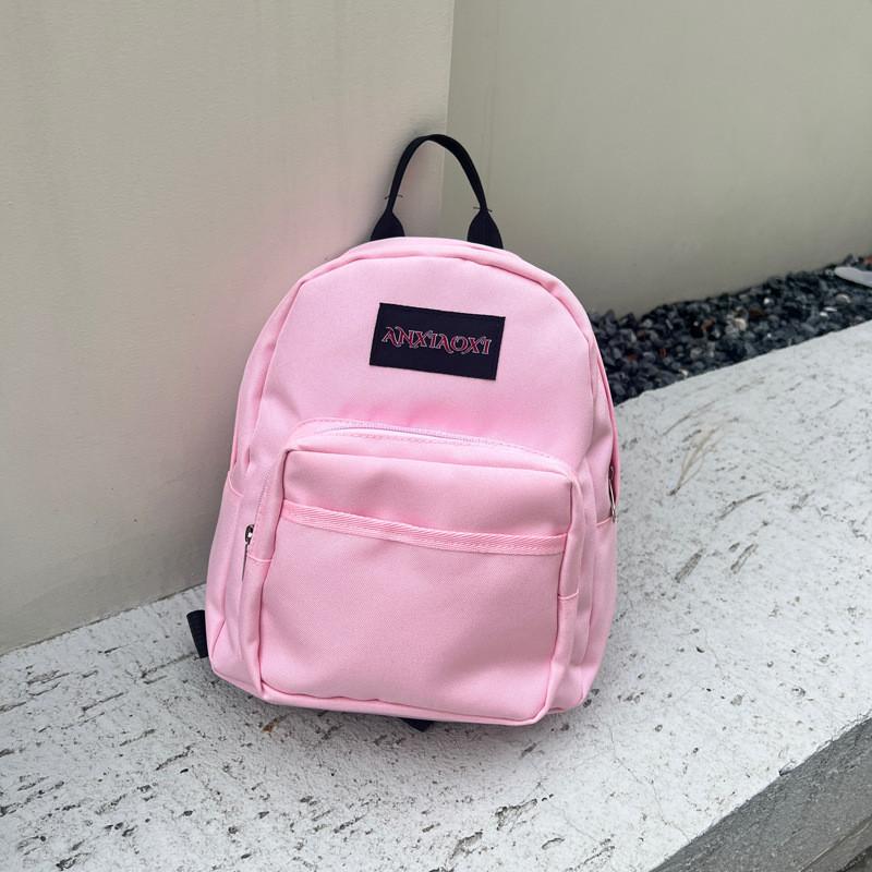 

Модний та стильний дитячий рюкзак з дизайном літер та м якими лямками для подорожей рожевий