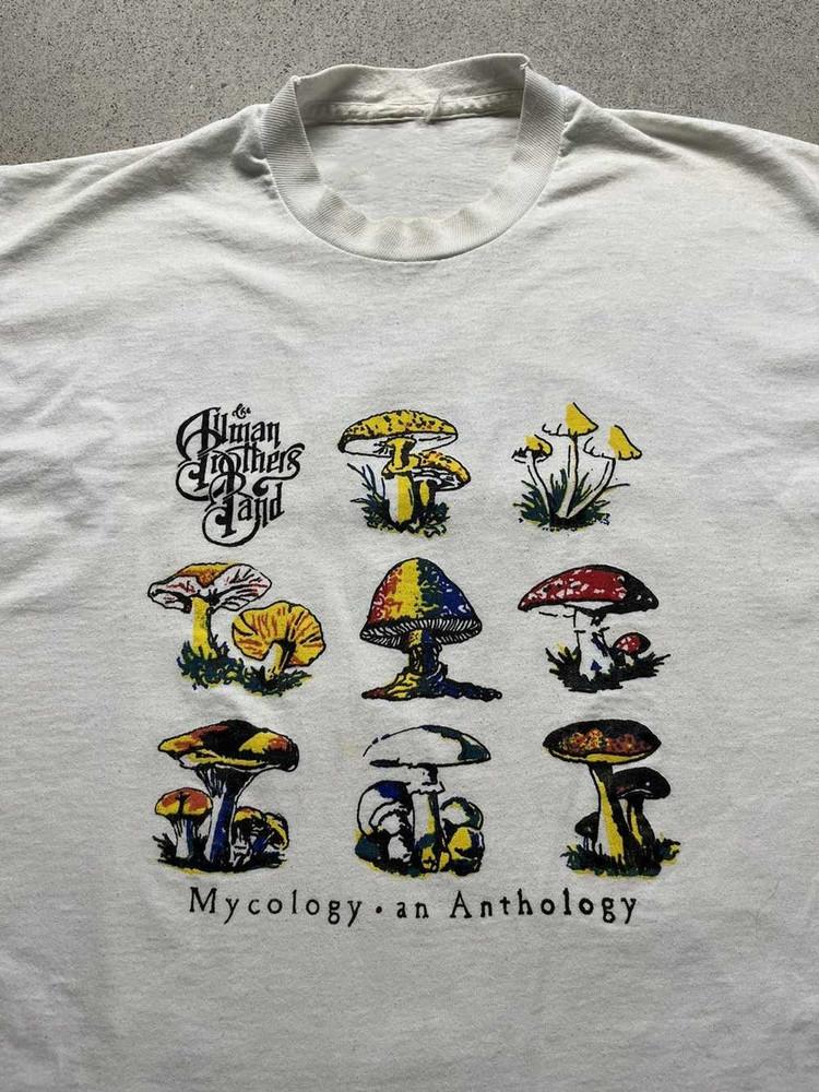 

Mycology An Anthology The Allman Brothers Band White T-Shirt VN1650 Unisex T-Shirt XL