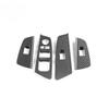 BMW 5 Series Carbon Fiber Interior Trim: Center Console, Gear Shift, Multimedia Panel, Air Vents.