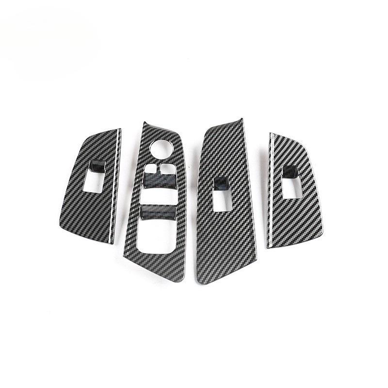 BMW 5 Series Carbon Fiber Interior Trim: Center Console, Gear Shift, Multimedia Panel, Air Vents.