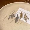 Boucles d'oreilles à pampilles longues en forme de feuille, légères, luxueuses et polyvalentes, au tempérament super immortel, pour femmes