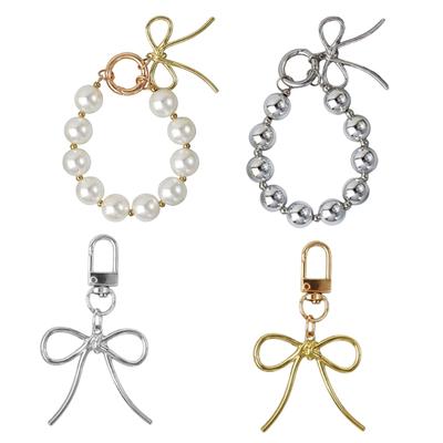 Porte-clés délicat avec nœud papillon perlé, breloque pour téléphone, porte-clés unique, pendentif de sac pour clé de voiture, portefeuille, sac à dos, bourse