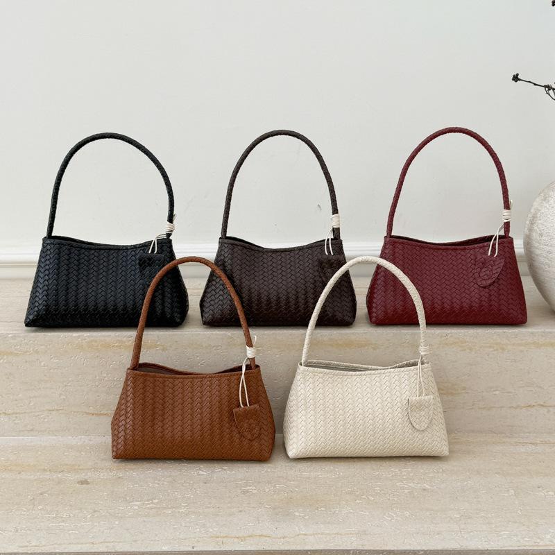 Niche design woven dumpling bag women's new seasonal simple texture foreign personality trendy shoulder bag