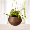 Vaso da fiori emisferico marrone da appendere per piante sul balcone