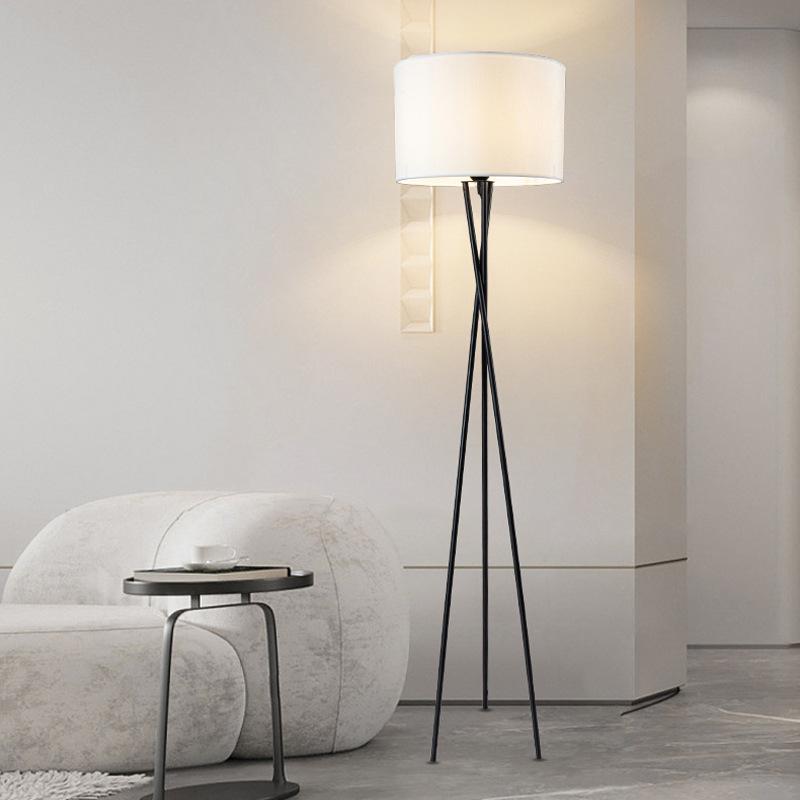Nordic Modern Three-Legged Floor Lamp - Elegant Minimalist Lighting for Living Room, Bedroom, or Homestay.