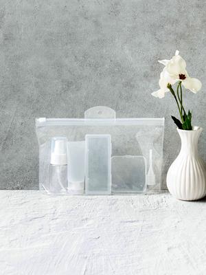 Portable Travel Cosmetic Refill Bottle Set - 4 Pcs