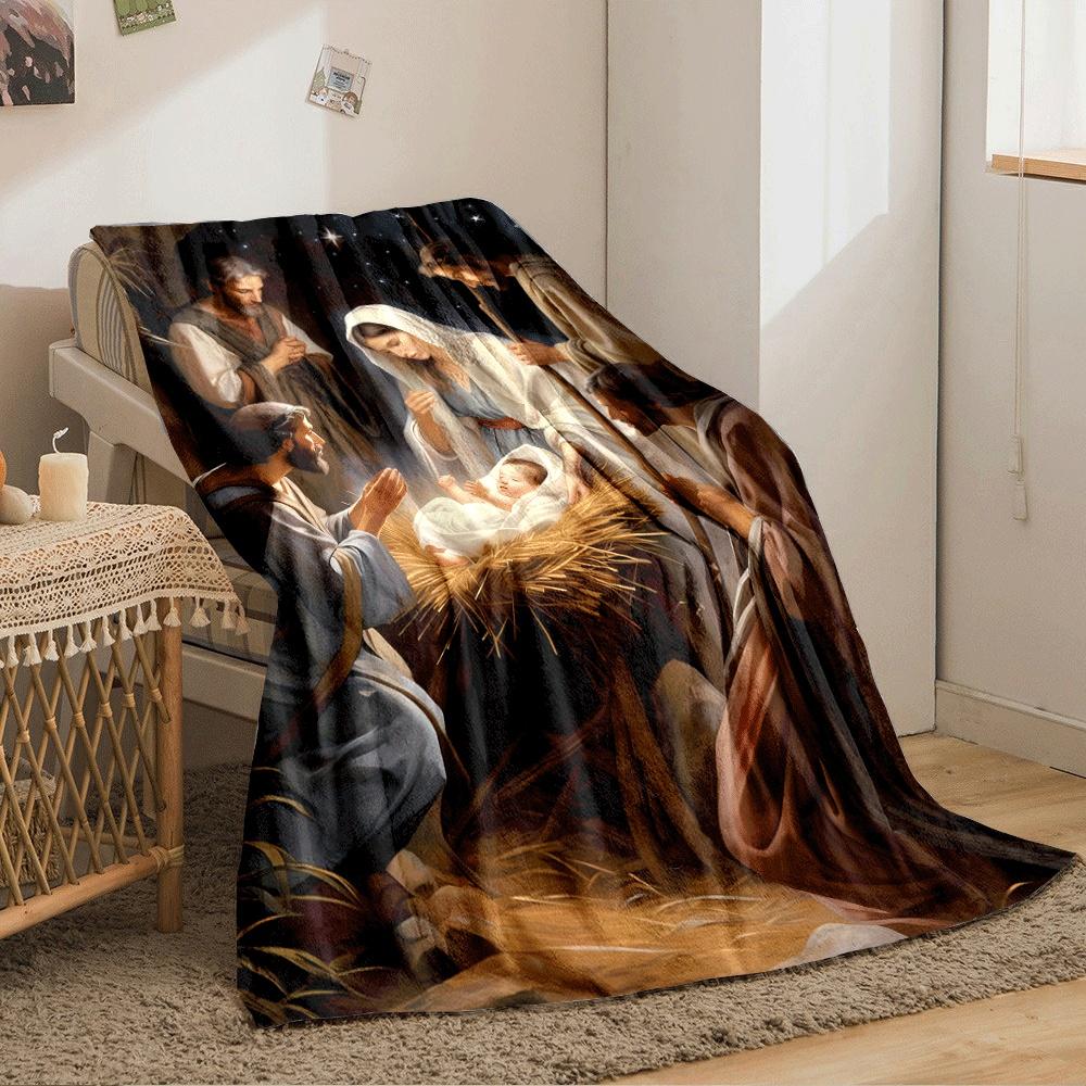 A radiant newborn in a manger surrounded by figures under a glowing sky. for all seasons blanket lunch break throw gift