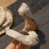 2025 summer hollow Korean version flat bottom outer wear half slippers women's flower casual bag head solid color slippers