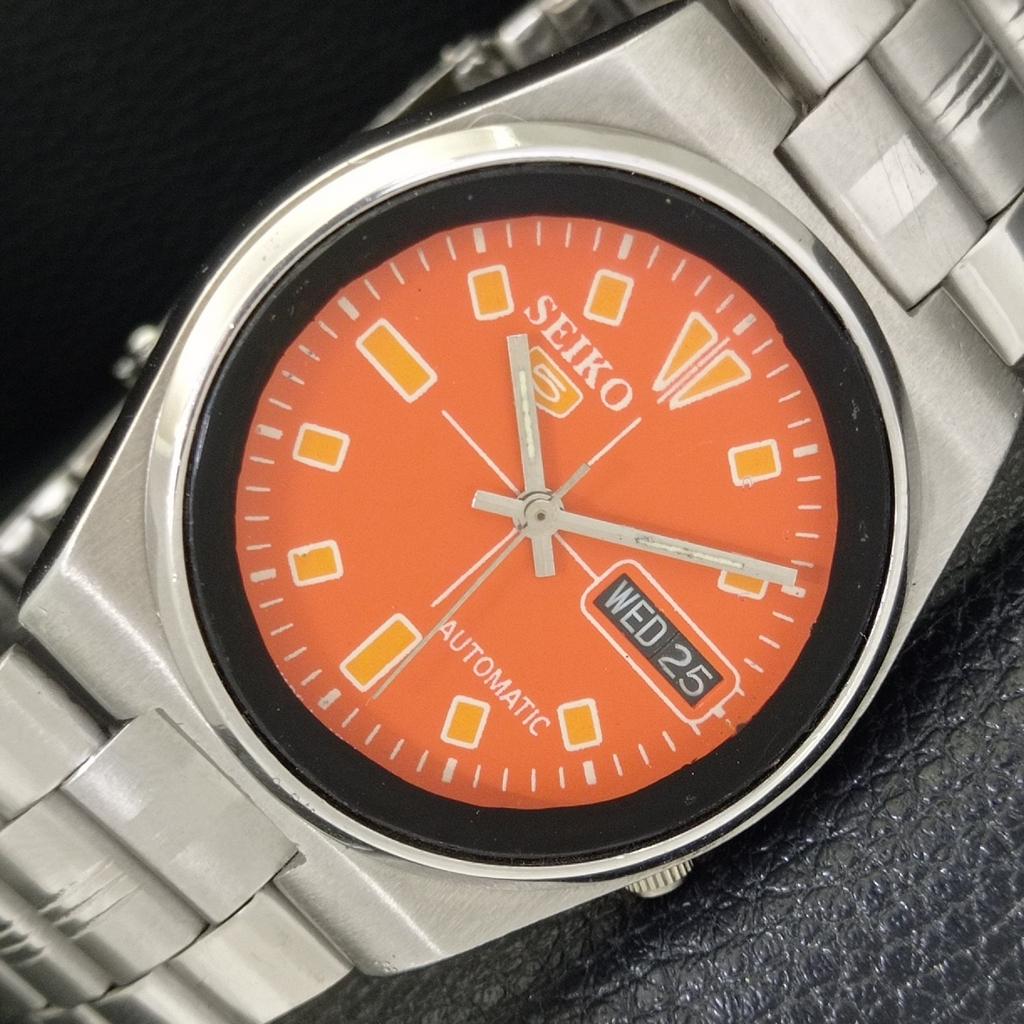 

ОРИГИНАЛЬНЫЕ ВИНТАЖНЫЕ МУЖСКИЕ АВТОМАТИЧЕСКИЕ ЧАСЫ SEIKO 5 JAPAN 7009A С ОРАНЖЕВЫМ ЦИФЕРБЛАТОМ a702121-5 R208-a702121