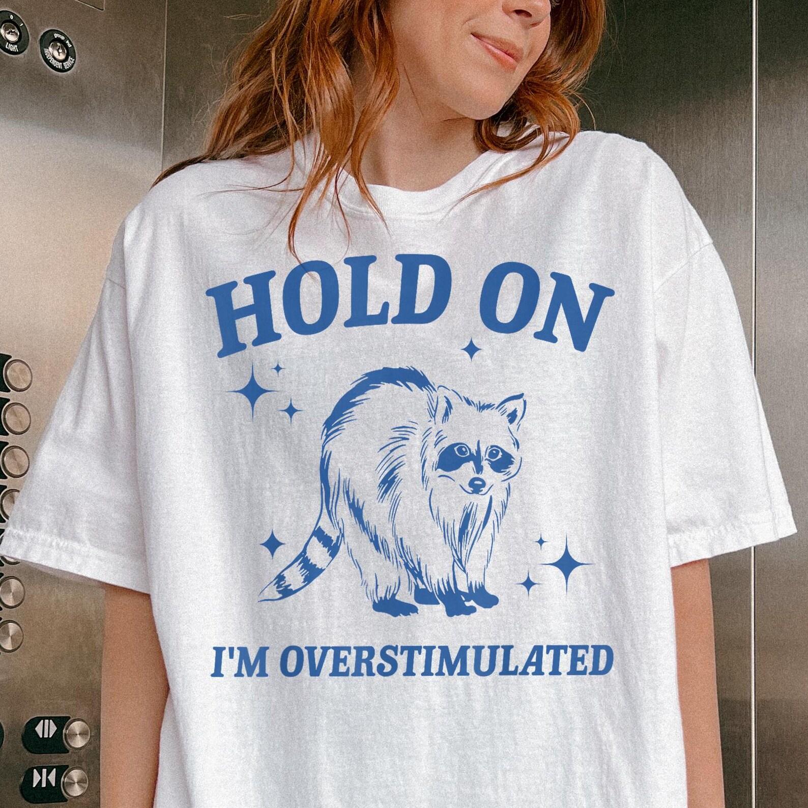 Comfort Colors® Hold On I m Overstimulated Shirt -Funny Saying Shirt,Quote Shirt,Raccoon Meme Shirt,Funny Raccoon Shirt,Hold On Partner 4XL