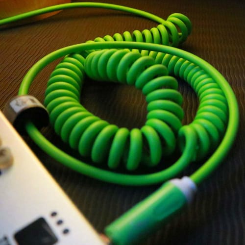Aestivate 10m Coiled Guitar Cable with Bass Shield and 6.35mm Stereo Plug for Instruments (Green)